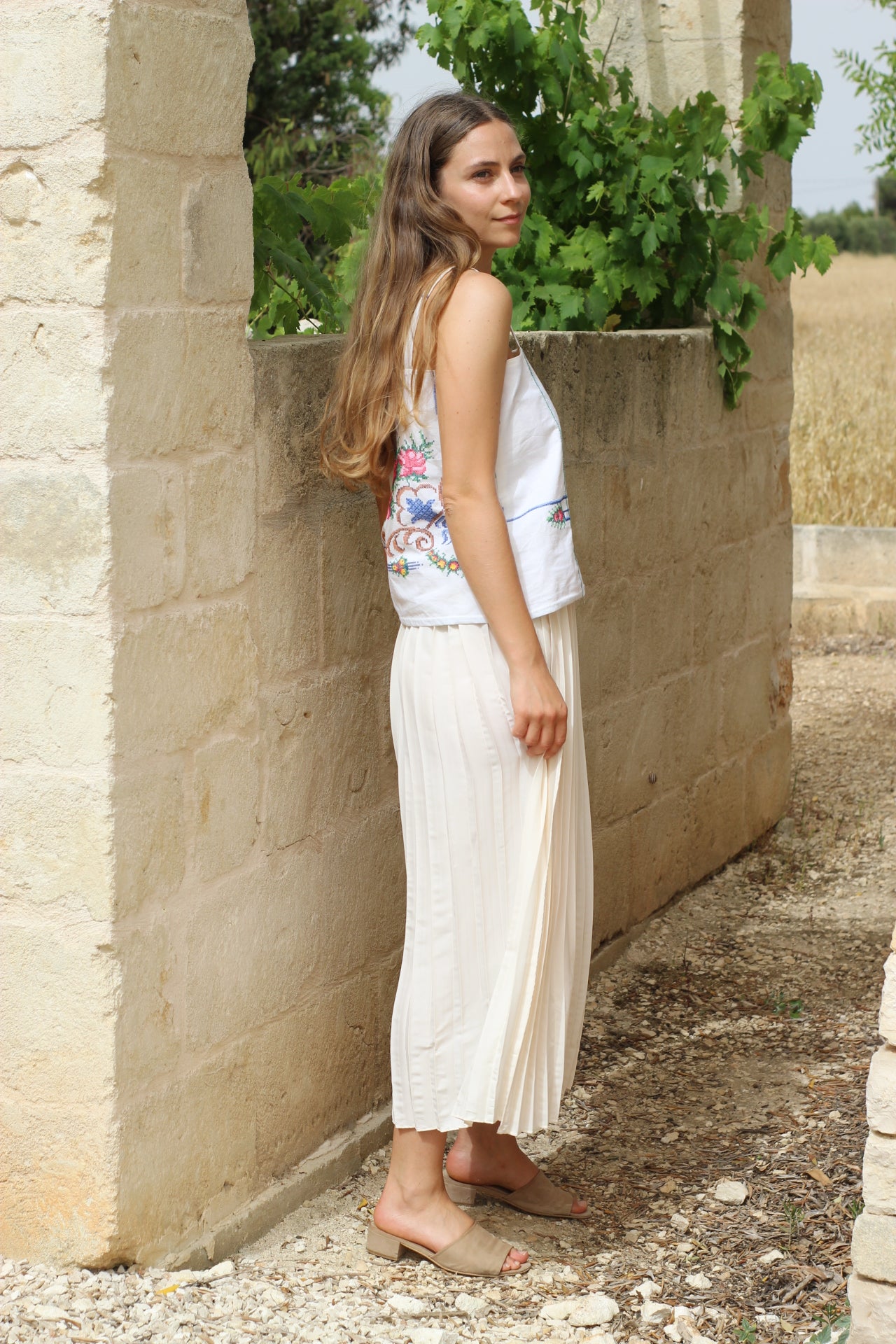 Long white pleated skirt