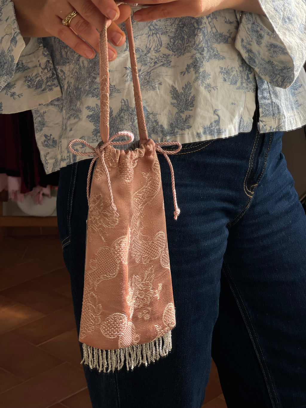 Borsina jacquard con frange perline