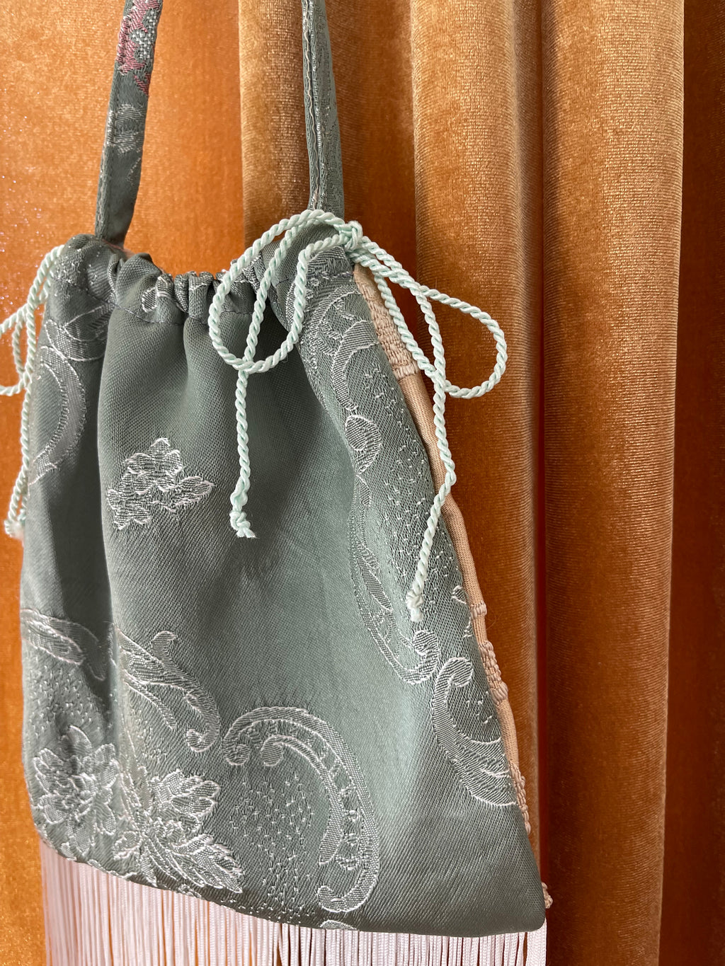 Borsina jacquard vintage con frange