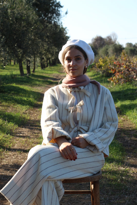 Giacchina con fiocchi in lana