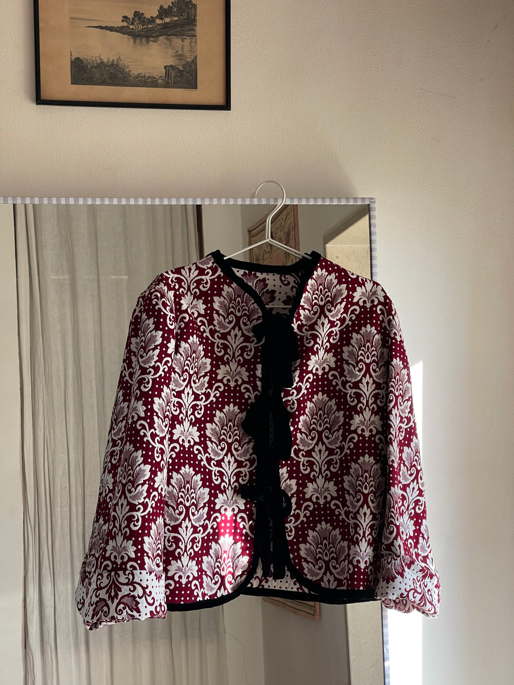 Jacket with jacquard bows