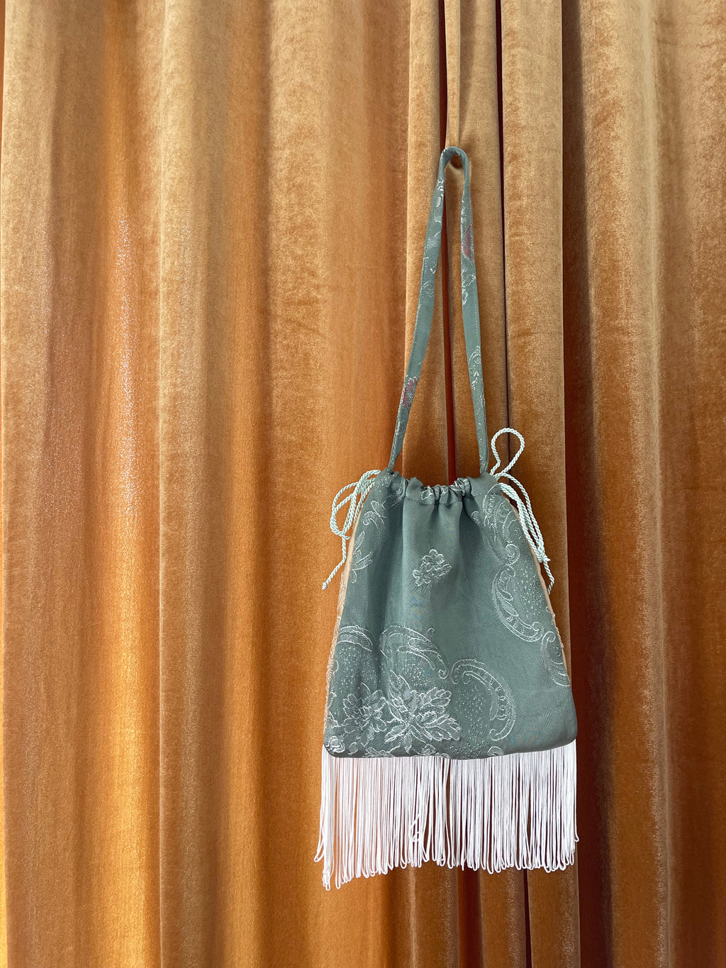 Borsina jacquard vintage con frange