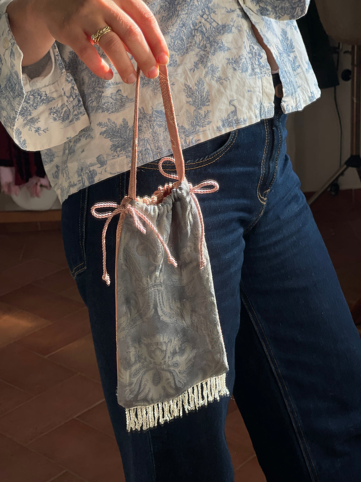 Borsina jacquard con frange perline