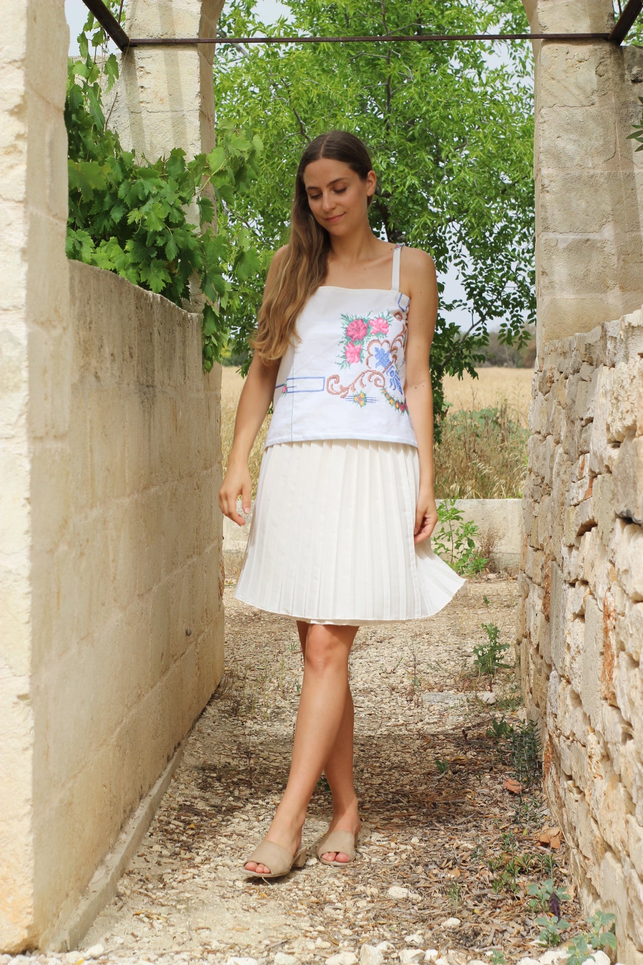 Short white pleated skirt