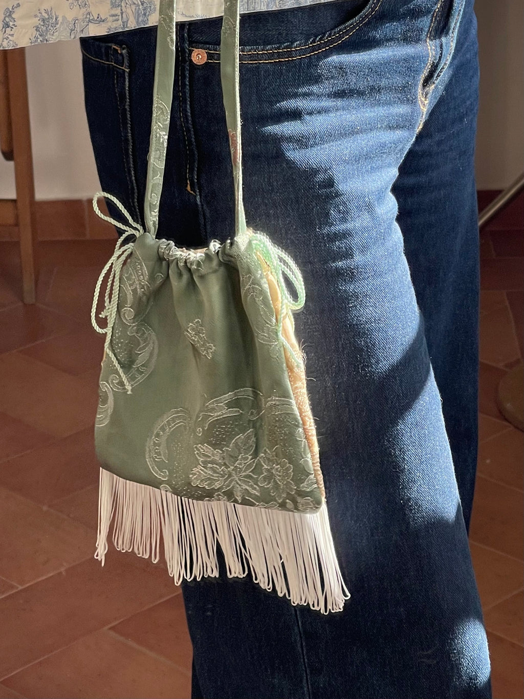 Borsina jacquard vintage con frange