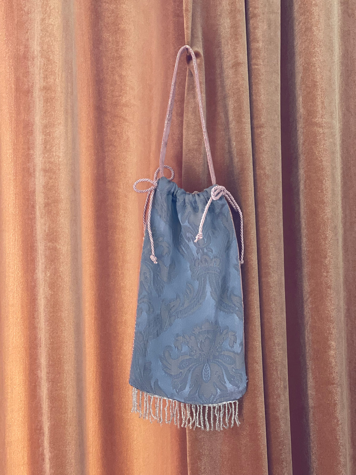 Borsina jacquard con frange perline