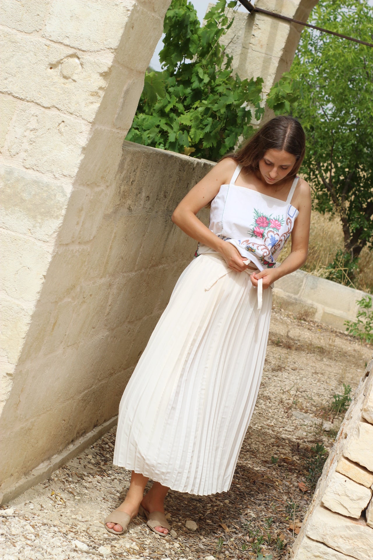 Long white pleated skirt