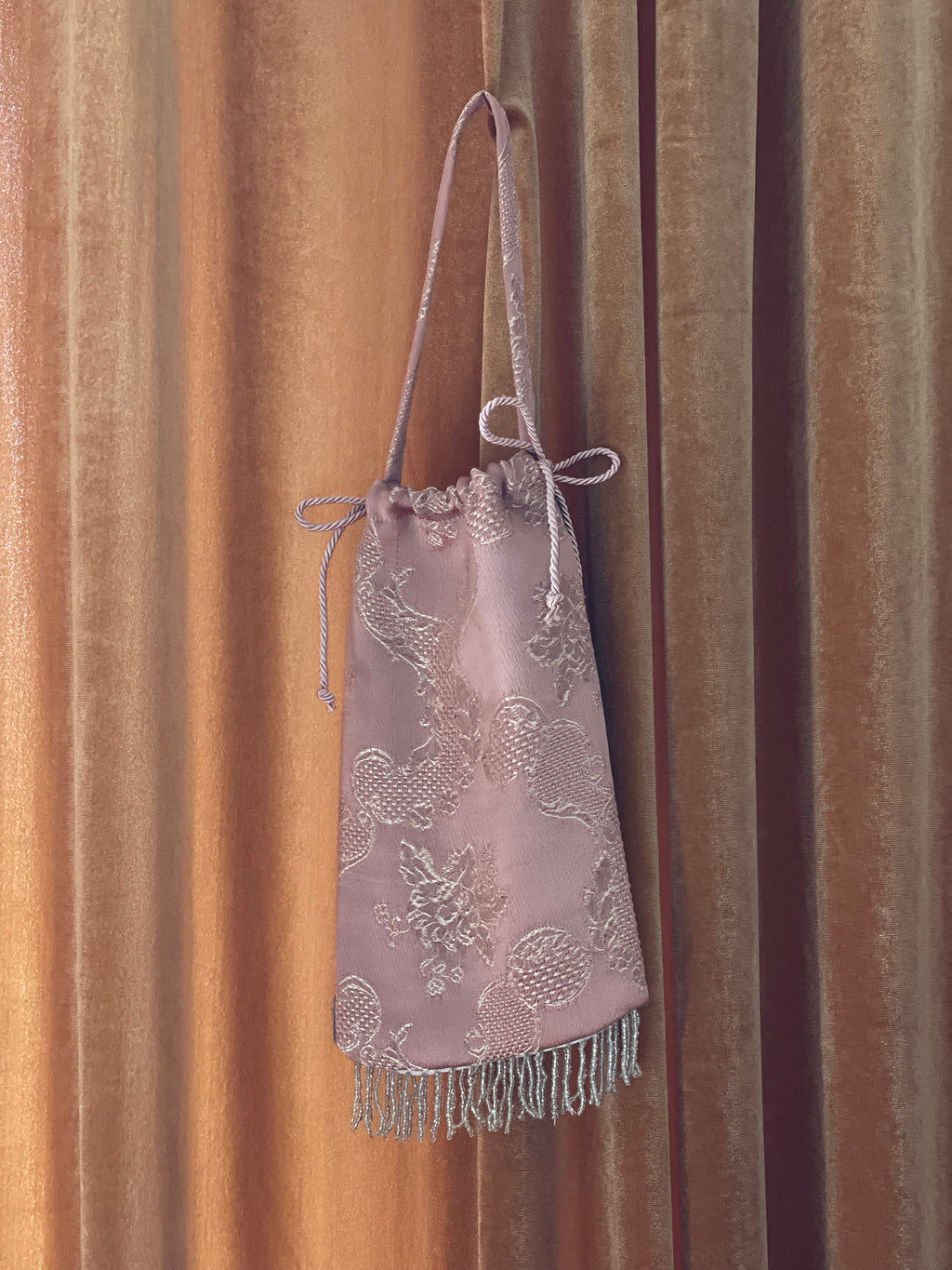 Borsina jacquard con frange perline