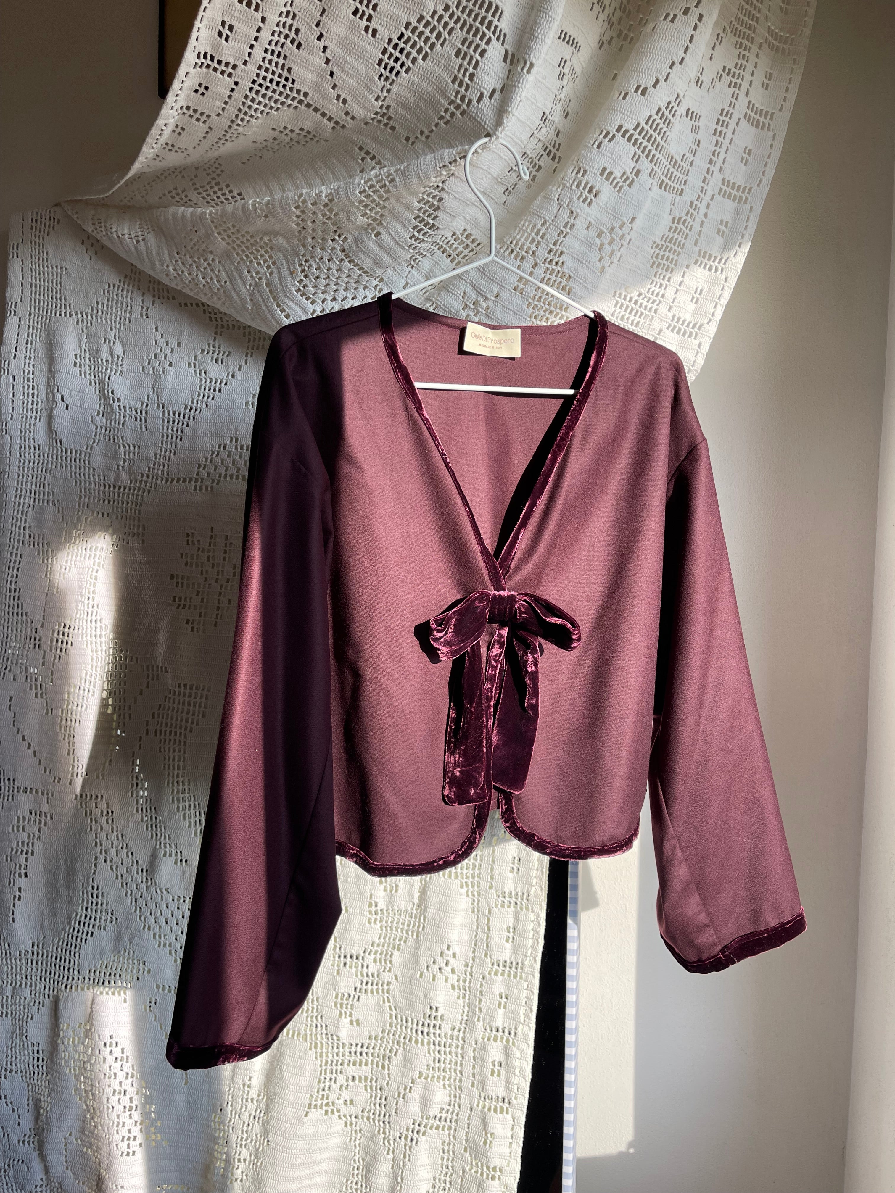 Cardigan Fiocco in lana pura scollo a V