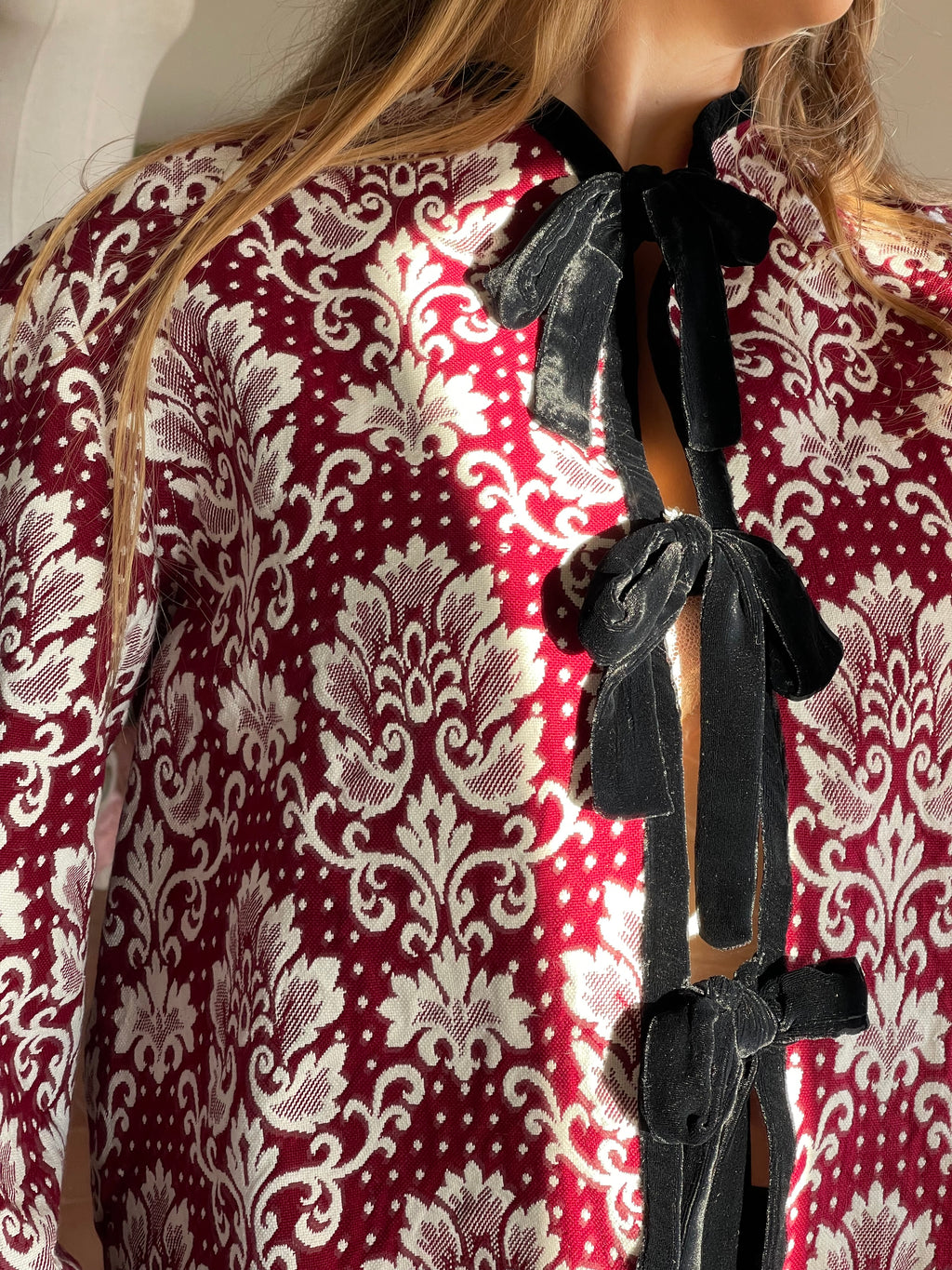 Jacket with jacquard bows