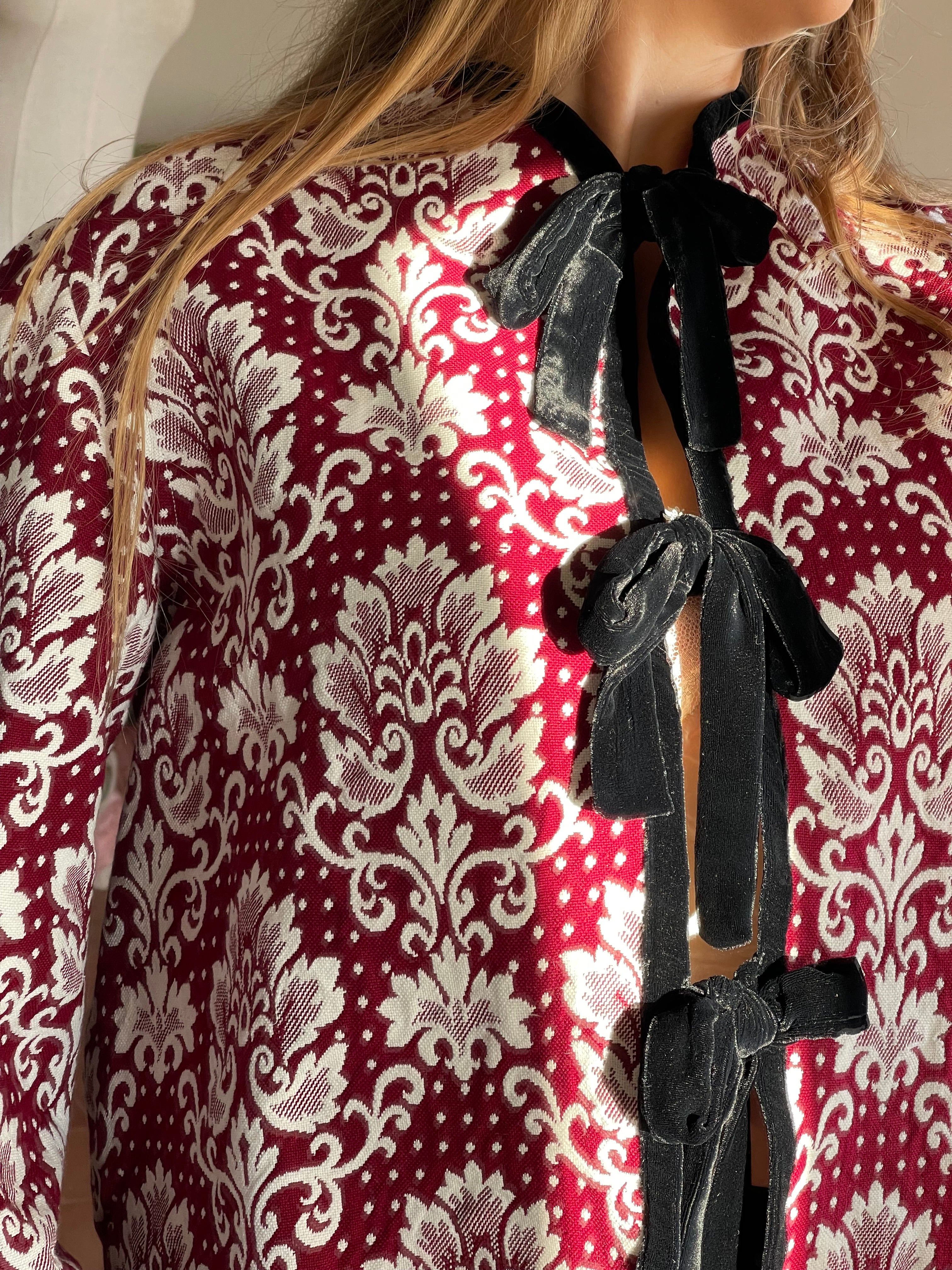 Jacket with jacquard bows