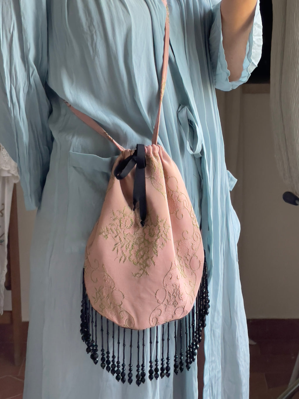 Borsina jacquard con frange perline