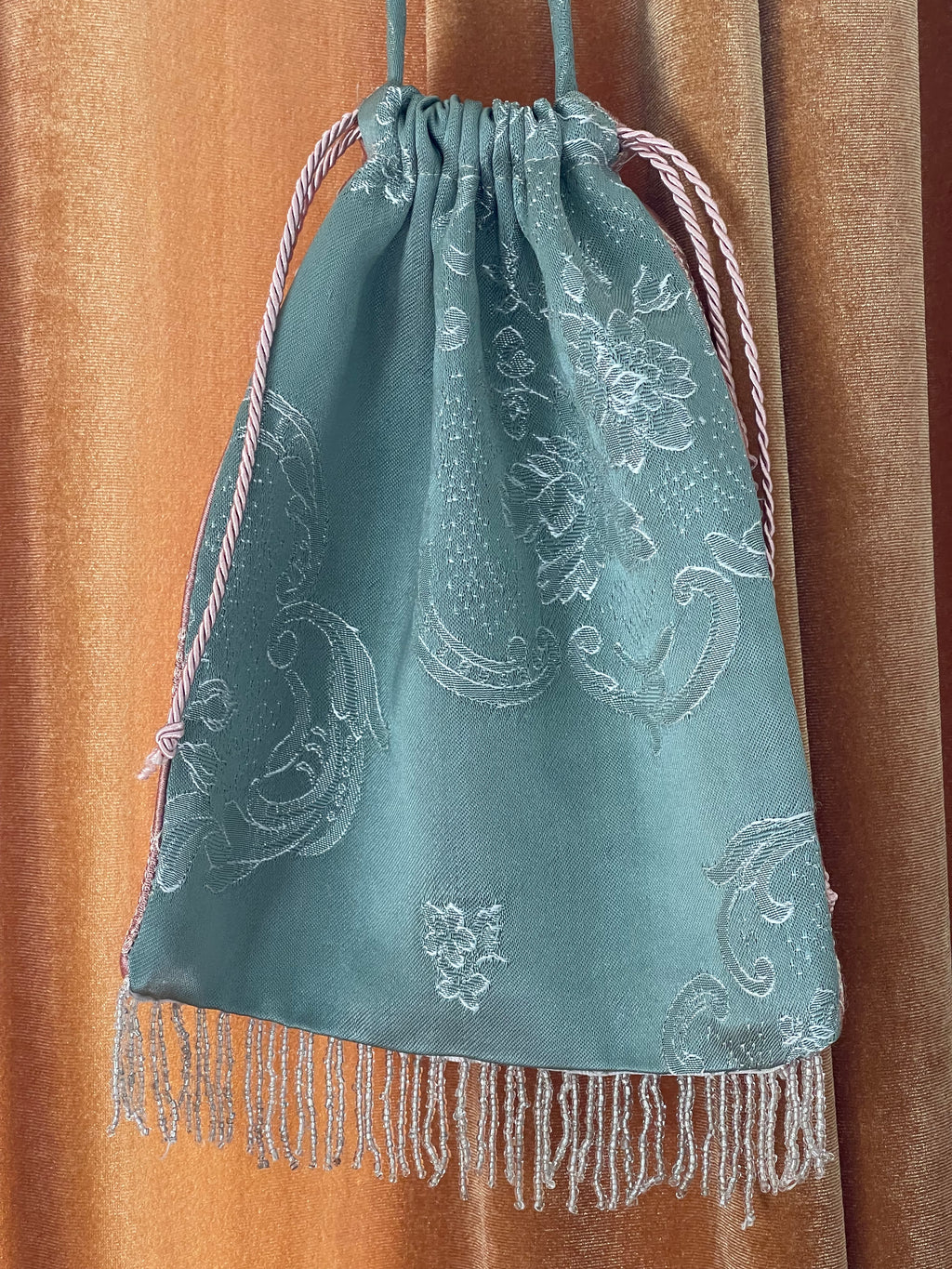 Borsina jacquard con frange perline