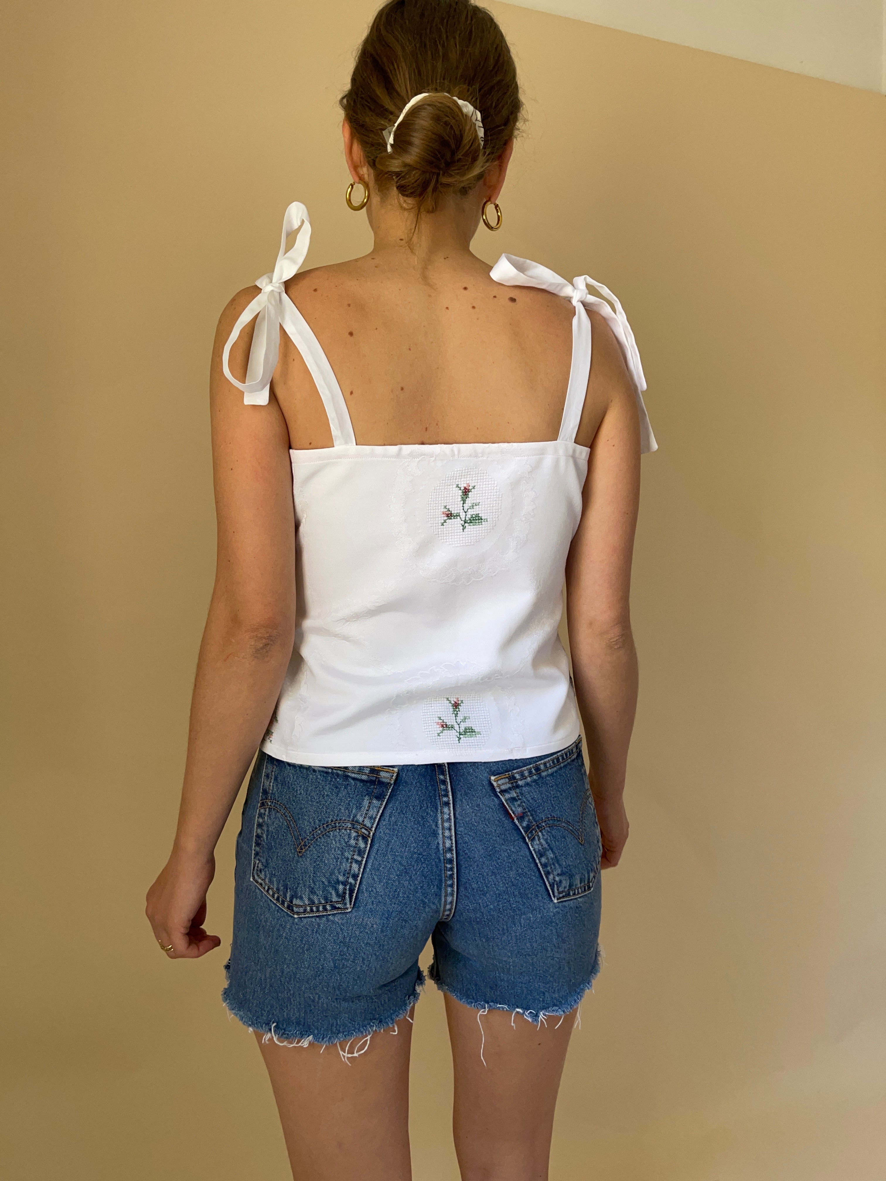 Top SPF cotone ricamato